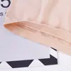Sujetador strapless de una sola pieza sin costuras de alta elasticidad, transpirable, anti-exposición, venta directa del fabricante