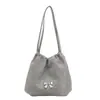 Bolsa de Ombro Estilosa de Alto Acabamento Estilo Coreano Nova Moda Primavera 2026 Bolsa Saco com Cordão de Laço de Grande Capacidade para Mulheres