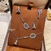 Pulsera Popular de Bádminton Incrustada de Diamantes de Xiaohongshu, Elegante y Lujoso Collar de Raqueta de Bádminton Cepillada, Juego de Pendientes con Borlas