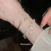Alas de Mariposa Niebla de Durazno~Flor de Zirconia Pulsera de Perlas de Mariposa Pulsera Estilo Princesa Dulce Joyería de Mano Exquisita de Alta Gama para Mujeres