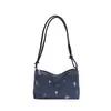 Bolso de Hombro de Lona Bordado Casual de Nicho Denim 2026 Nueva Moda Gran Capacidad Tote para Viajes Versátil