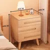 Mesita de noche de madera maciza para dormitorio del hogar 2026 Venta caliente Creativa Pequeño Armario de almacenamiento simple para niños Mesita de noche de tronco