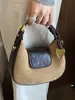 Colección Otoño 2026 para mujer de alta gama, versátil, a la moda y retro: Bolso de hombro, bolso de mano y bolso cruzado de nicho estilo japonés y coreano