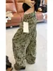 Jeans retro americanos con camuflaje y tachuelas para mujer, principios de otoño de 2026, estilo callejero, diseño moderno y genial, pantalones de pierna ancha hasta el suelo