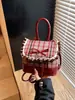 Bolso de Cuadros de Alta Gama para Mujer Transfronterizo Otoño e Invierno 2026 Nueva Moda Lazo Elegante Versátil Mini Mochila Tendencia