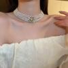 Corea del Sur Vintage Perla Diamante Borla Cadena de Cuello Celebridad Cibernética Sentido del Diseño Elegante Flor Lazo Cadena Clavicular Collar para Mujer