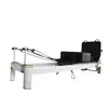 Cama blanca pequeña de aleación de aluminio para Pilates con rieles deslizantes silenciosos, Cama de núcleo de Pilates con marco de aluminio engrosado
