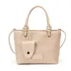 Bolsa de mão feminina, estilo coreano, de alta qualidade, versátil para o trabalho, bolsa de ombro única e transversal, design de nicho ins, bolsa feminina com padrão trançado