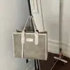 Bolso de gran capacidad para mujer para el trabajo, nuevo modelo 2026, bolso de mano de alta gama, bolso de hombro versátil, bolso tote cruzado