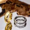 Suministro caliente transfronterizo anillo mágico de acero inoxidable anillo rey anillo europeo y americano anillo de pareja anillo liso Saturno moda masculina nicho