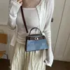 Bolso pequeño cuadrado de diseño único para mujer, nuevo modelo otoño 2026, diseño versátil de bloques de color, bolso de hombro/cruzado de lujo ligero y elegante