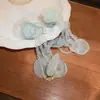 Pendientes de borla de flor de cuentas de color dopamina para primavera, sensación de lujo ligero y alta gama, pendientes atmosféricos estilo vacacional para mujer