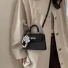 Bolso Kelly Elegante de Gama Alta, Bolso de Mano Versátil para Primavera/Verano, Bolso Pequeño Cuadrado, Nuevo Bolso de Hombro/Cruzado de Moda 2026 para el Trabajo