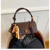 Bolso de Mano de Estilo Coreano de Nicho 2026 Otoño Nuevo Bolso Cruzado de Color Sólido con Textura a la Moda Bolso Simple de Alto Valor para Mujer