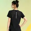 Camiseta de manga corta para yoga deportivo 2026 nuevo modelo corte holgado secado rápido para correr entrenamiento top deportivo Pilates