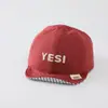 Sombrero de color sólido versátil para bebé con ala suave al por mayor nuevo sombrero solar transpirable para niño pequeño gorra de béisbol linda de cachorro para bebé