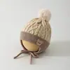 Gorro coreano Yipan para bebé para otoño e invierno, lindo y versátil, con un pompón de osito, gorro cálido con protección para las orejas del bebé, gorro de poner