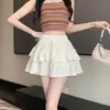 Ropa de Mujer de Comercio Exterior Toma Real: Falda de pastel, Falda abullonada, Falda de cintura alta Primavera/Verano 2026, Falda corta estilo femenino, Falda media