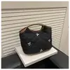 Bolsa de Axila de Nicho Moda Casual de Mano Pequeña para Otoño e Invierno 2025 para Mujer Nueva Bolso Plegado de Diamante para Almacenamiento de Maquillaje