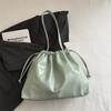 Bolso de Hombro de Moda con Cordón de Gran Capacidad de Cuero Suave 2025 Diseño Nicho de Alta Gama Nuevo Bolso Bucket para Mujer Primavera y Verano