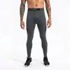 Mallas deportivas finas con logo personalizado, pantalones de compresión elásticos de secado rápido para correr, pantalones de compresión de entrenamiento físico con bloques de color para hombre