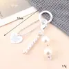 Nuevo llavero con lazo acrílico, colgante con personalidad, colgante para bolso, funda para auriculares, cadena, joyería