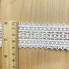 Fábrica en stock directo de cinta de cadena de poliéster de encaje blanco, accesorios de ropa, accesorios para muñecas y juguetes.