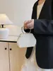 Bolso de mujer de moda transfronterizo, bolso tejido a mano con perlas, bolso de mano de perlas de alta gama, bolso vintage para novia y dama de honor, moderno