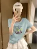 Blusa Casual Versátil Feminina de Algodão Texturizado com Floco de Neve, Manga Curta, Manga Dobrável, Atacado Shisanxing Roupas Femininas em Estoque