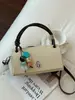 Bolso de textura de alta calidad para mujer 2026 nuevo estilo moderno versátil bolso cruzado bolso pequeño cuadrado de mano exquisito bolso de mano pequeño para salir