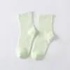 Meias básicas sem cor sólida padrão outono e inverno meias de algodão cor de doce meias femininas meias de chão atacado direto da fábrica