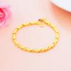 Pulsera de trébol de cuatro hojas invertida de doble cara al por mayor para mujer chapada en oro de latón, pulsera de oro arena de Vietnam con cabeza de conejo y corazón de melocotón