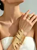 Set de 2 piezas de pulsera y anillo de estilo europeo y americano con textura metálica exagerada y diseño abierto único, joyería de alta gama