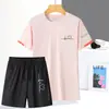 Conjunto Esportivo de Seda Gelada de Verão Secagem Rápida Respirável Camiseta Gola Redonda Conjunto Curto Tendência Feminina Conjunto de Duas Peças para Corrida e Montanhismo Absorvente de Suor