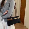 Bolso de gamuza para mujer, nuevo y moderno estilo retro de otoño 2026, adecuado para ir al trabajo, bolso de hombro de gran capacidad, bolso de axila