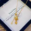 Tienda de oro Puzuo con el mismo estilo collar de borla de seda de oro arenoso de carpas para mujer nuevo retro chino cadena para la clavícula de pez dorado de la suerte