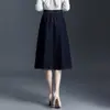Falda casual de mezclilla línea A para mujer, nuevo estilo otoño 2026, elegante y estilizante, falda de paraguas con dobladillo ancho, falda de longitud media