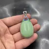 Wanjade al por mayor Colgante en forma de huevo de piedra luminosa incrustada Colgante de cadena para suéter de perla luminosa Colgante de jade