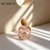 Frasco de Perfume Frasco de perfume redondo plano roliço padrão de pedra tampa de bola tampa de flor estilo duplo frasco de vidro de alta transparência em estoque