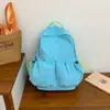 Nova mochila de nylon colorida tipo macaron 2026 para mulheres, leve, pode ser usada como bolsa de viagem ou mochila escolar para estudantes do ensino fundamental