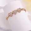 Pulsera Nueva de Corazón Cruzado Europea y Americana, Nuevo Modelo Más Vendido con Corazón en Forma de Corazón Incrustado con Circonita, Pulsera de Moda Personalizada Hip-Hop