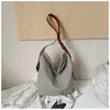 Bolsa Tote Estilo Preguiçoso Coreano de Nicho Feminina 2026 Outono Inicial Nova Grande Capacidade para o Dia a Dia Ombro Único Transversal