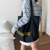 Bolsa de Lona com Letra Estilo College para Mulheres 2025 Nova Tendência Moda Estilo Coreano Bolsa Tote Casual Grande Capacidade Bolsa de Compras