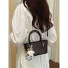 Bolsa de alta qualidade com padrão trançado de nicho para mulheres, nova moda 2026, bolsa transversal versátil retrô, bolsa de mão, bolsa saco