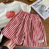 Traje Infantil de Manga Corta, Nuevo Estilo de Verano para Niños Pequeños y Medianos, Tops Elegantes para Niños y Niñas, Conjunto de Dos Piezas con Shorts Rayados, Moderno