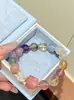 Pulsera de un solo bucle de cristal con múltiples elementos y múltiples gemas, de moda, con amatista, cristal de fresa, aguamarina y cuarzo rutilado dorado, estilo de lujo ligero para mujer