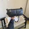 Bolso tipo baguette versátil de gran capacidad, moda de verano 2026, transfronterizo, bolso de mano de nicho para mujer, de hombro y cruzado