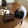Bolso de hombro cruzado para mujer estilo Chanel con patrón de rombos y cadena 2026 nuevo bolso de hombro único bolso hobo con cordón de alta gama