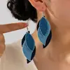 Brincos de sentido de design de liga de estilo frio europeu e americano para mulheres brincos de folha retrô Brincos de moda de joias transfronteiriças para mulheres