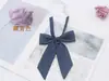Corbata de Moño Larga Diagonal de Cuadrícula de Cubo Mágico al por Mayor en Stock para Mujer, Accesorio de Traje de Marinero Estilo Coreano, Corbata de Moño Jk Estilo Universitario